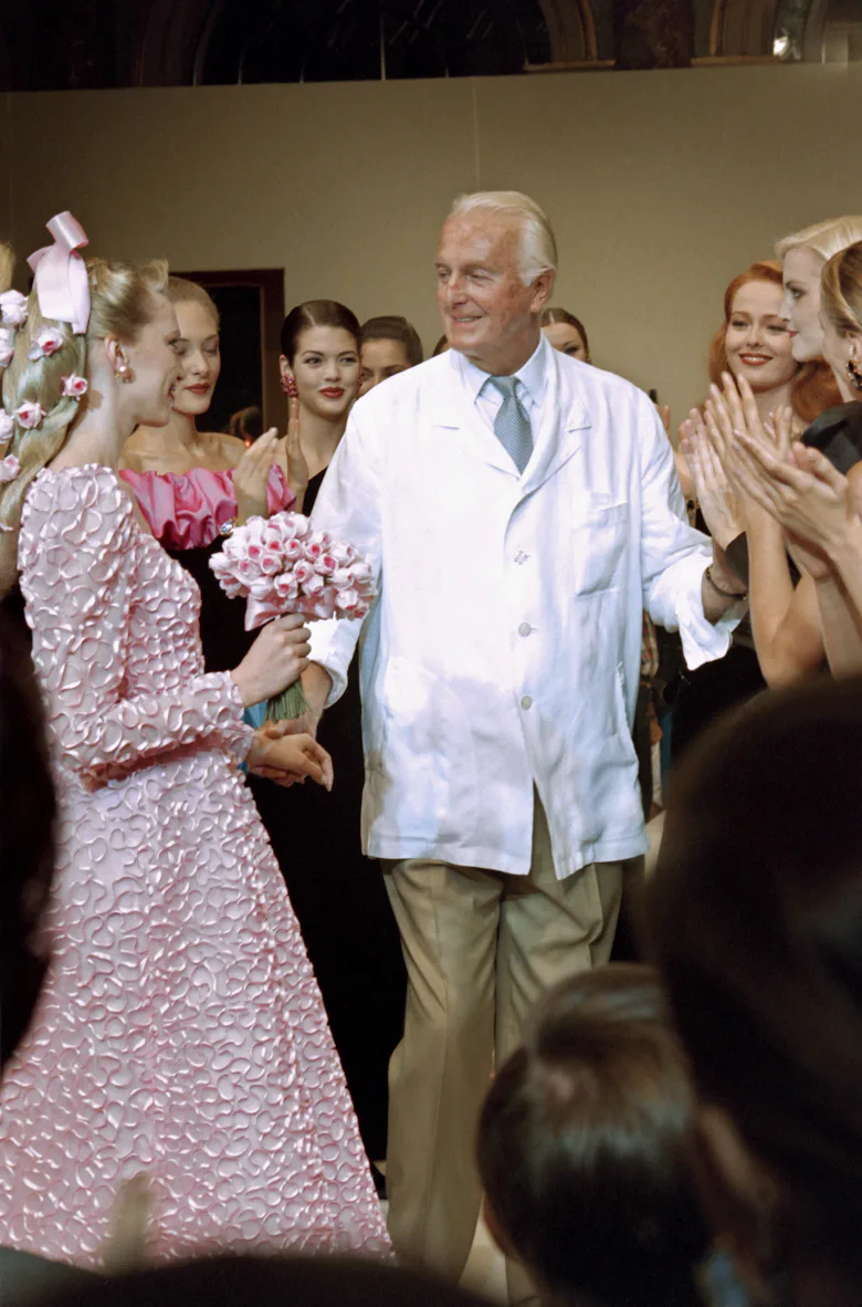 French fashion designer Hubert de Givenchy acknowledges applause at the end of his Fall/Winter 1995/...