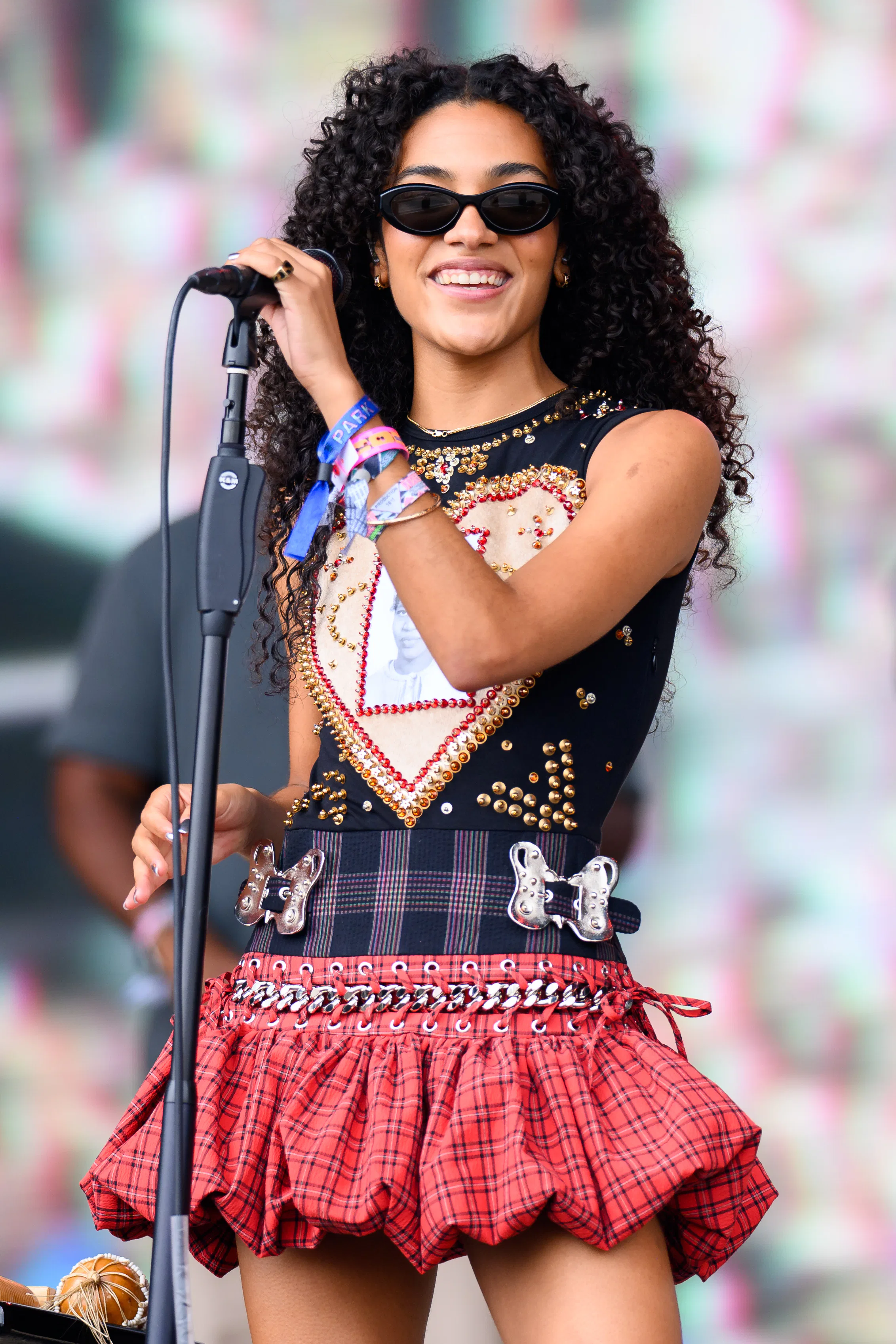 GLASTONBURY, ENGLAND - JUNE 28: Olivia Dean performs on the Pyramid Stage during day three of Glasto...