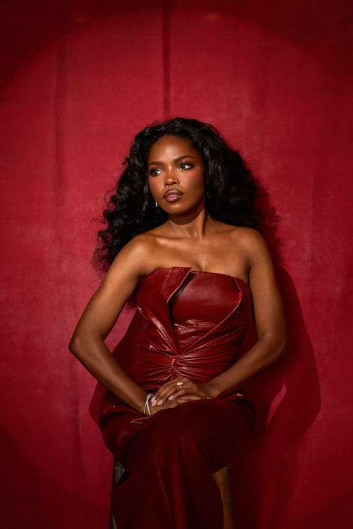 Ryan Destiny in a portrait with flowing hair and brown-toned makeup