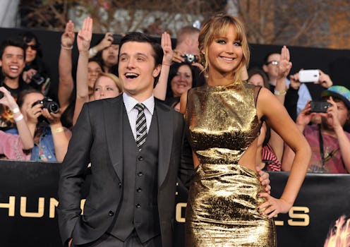 Actors Josh Hutcherson (L) and Jennifer Lawrence arrive at the premiere of Lionsgate's "The Hunger G...