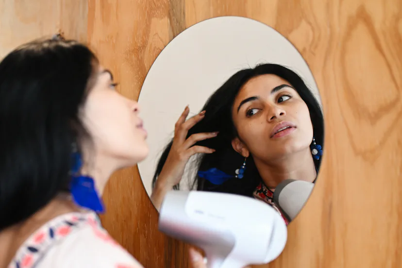 Put on a little makeup to start your day on the right foot.