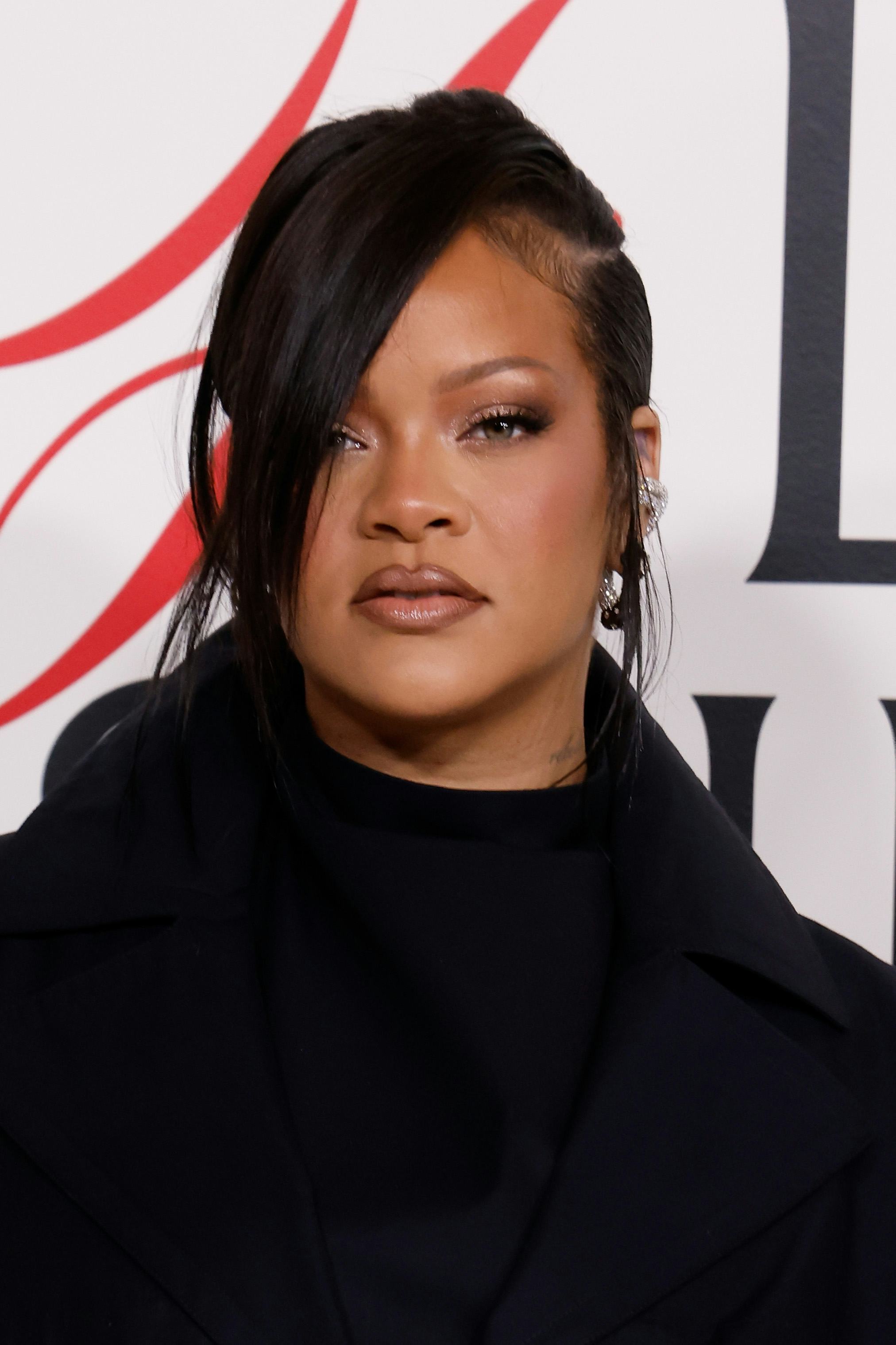 Close up of Rihanna with defined lips and side bangs