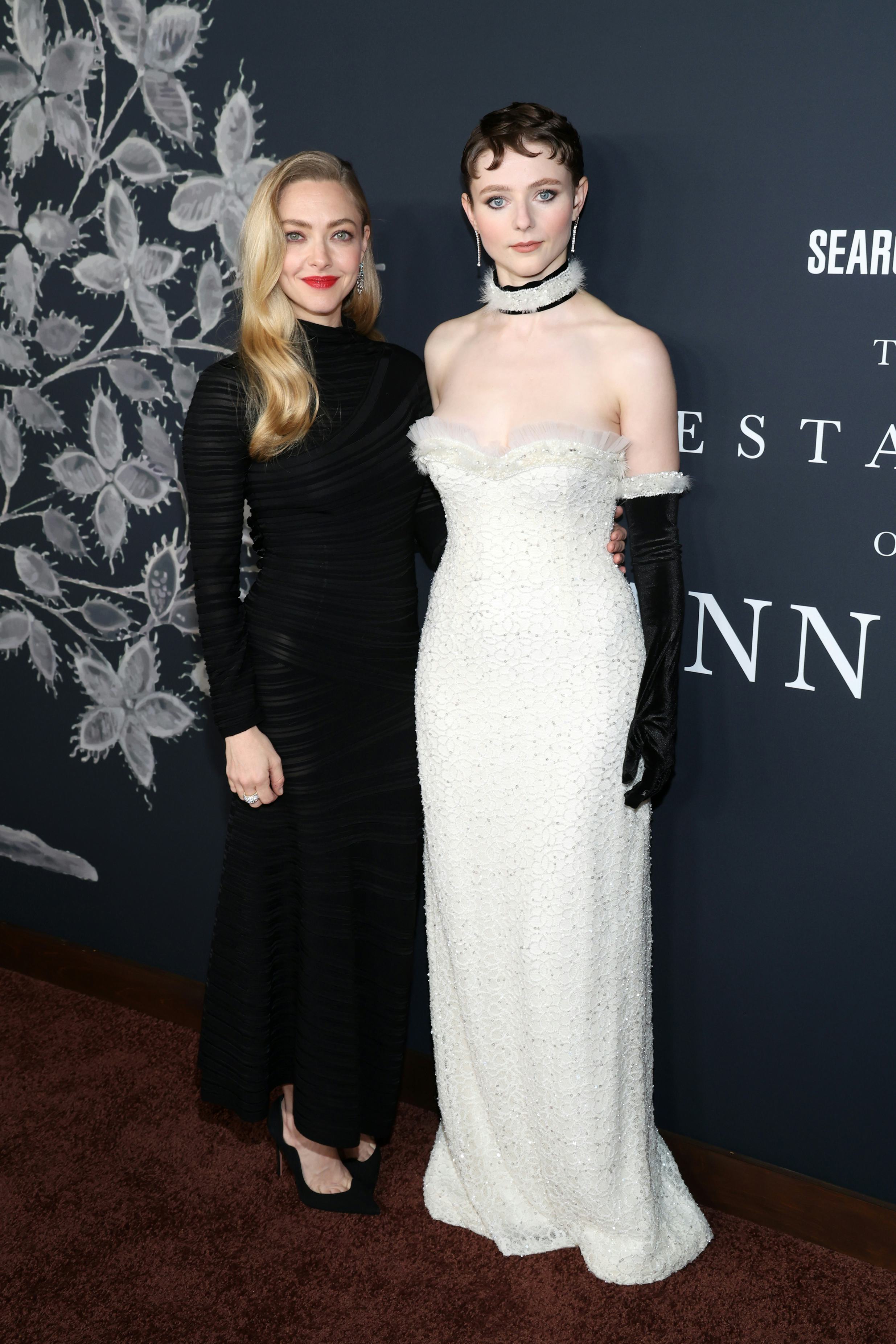 LOS ANGELES, CALIFORNIA - DECEMBER 14: (L-R) Amanda Seyfried and Thomasin McKenzie attend "The Testa...