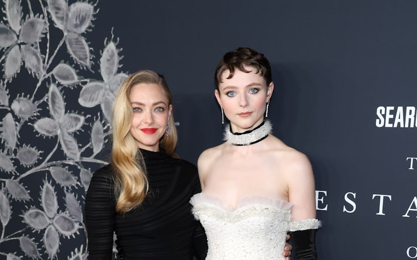 LOS ANGELES, CALIFORNIA - DECEMBER 14: (L-R) Amanda Seyfried and Thomasin McKenzie attend "The Testa...