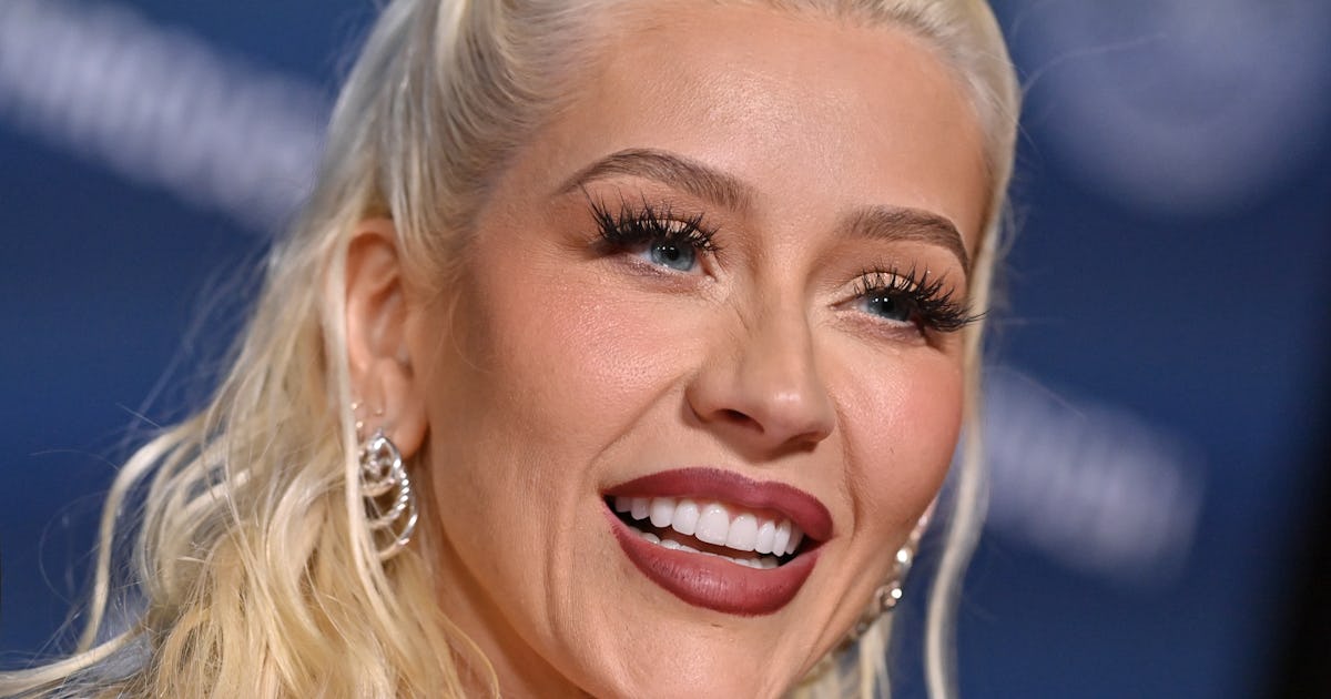 Xtina Forgot To Wear Pants With Her "Holiday Raspberry" 'Fit