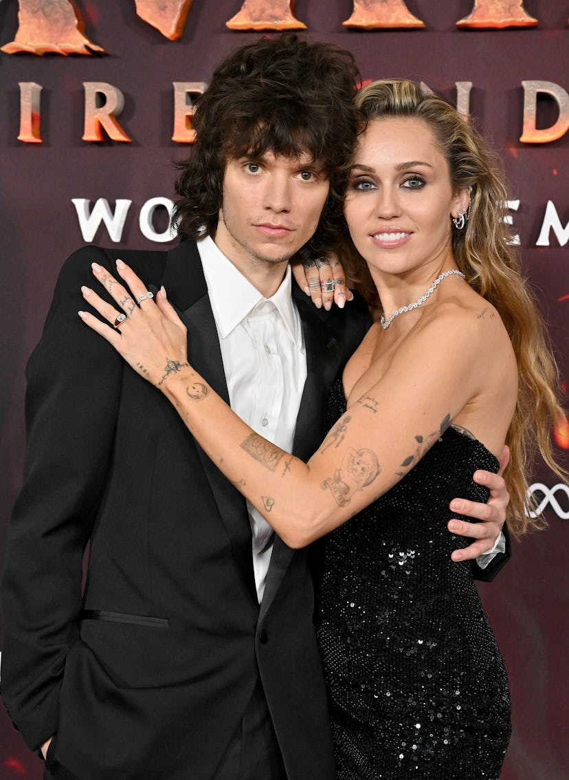 Maxx Morando and Miley Cyrus attend the Global Premiere of "Avatar: Fire and Ash"