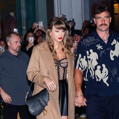 NEW YORK, NEW YORK - OCTOBER 11: Taylor Swift (L) and Travis Kelce are seen in SoHo on October 11, 2...