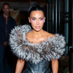 Kim Kardashian wore a sheer top to the Kardashian-Jenner family holiday party in 2015.