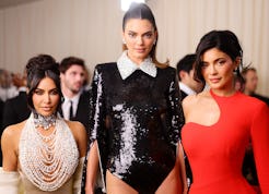 Kendall and Kylie Jenner and Kim Kardashian's Christmas 2025 outfits included plunging, designer dre...
