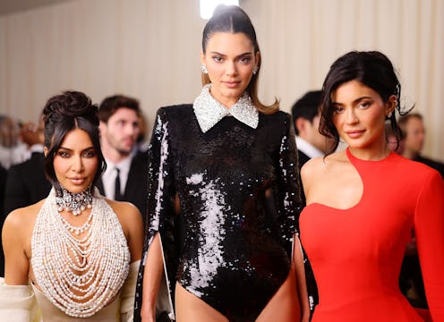 Kendall and Kylie Jenner and Kim Kardashian's Christmas 2025 outfits included plunging, designer dre...
