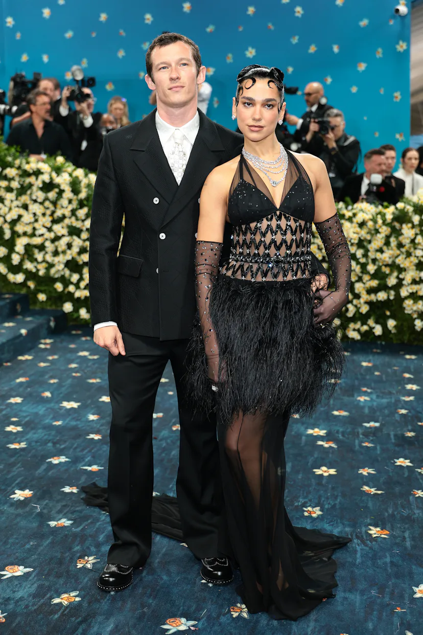Callum Turner and Dua Lipa attend the 2025 Met Gala Celebrating "Superfine: Tailoring Black Style" a...