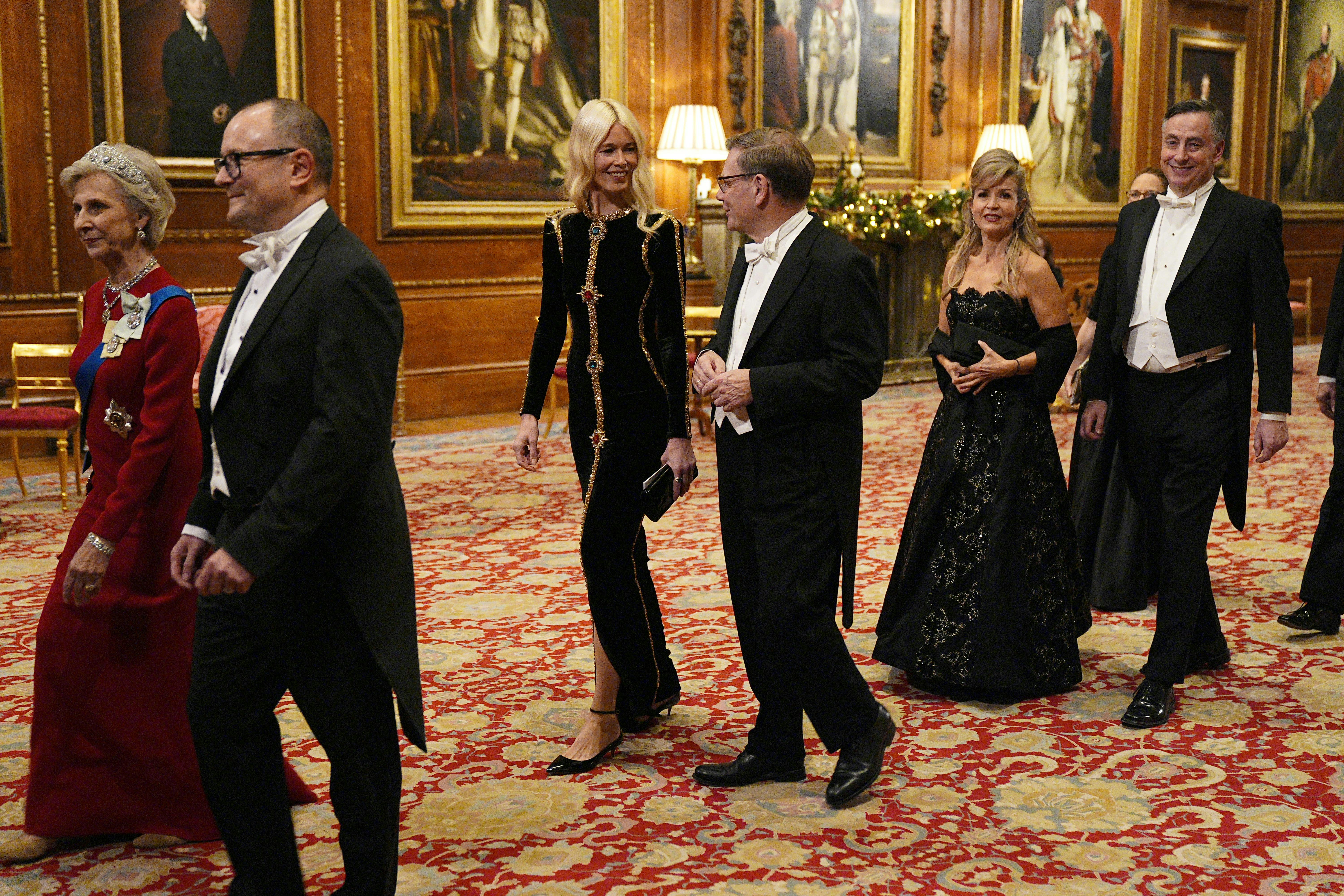 Claudia Schiffer (C-L) arrives ahead of the state banquet for the German President and his wife Elke...