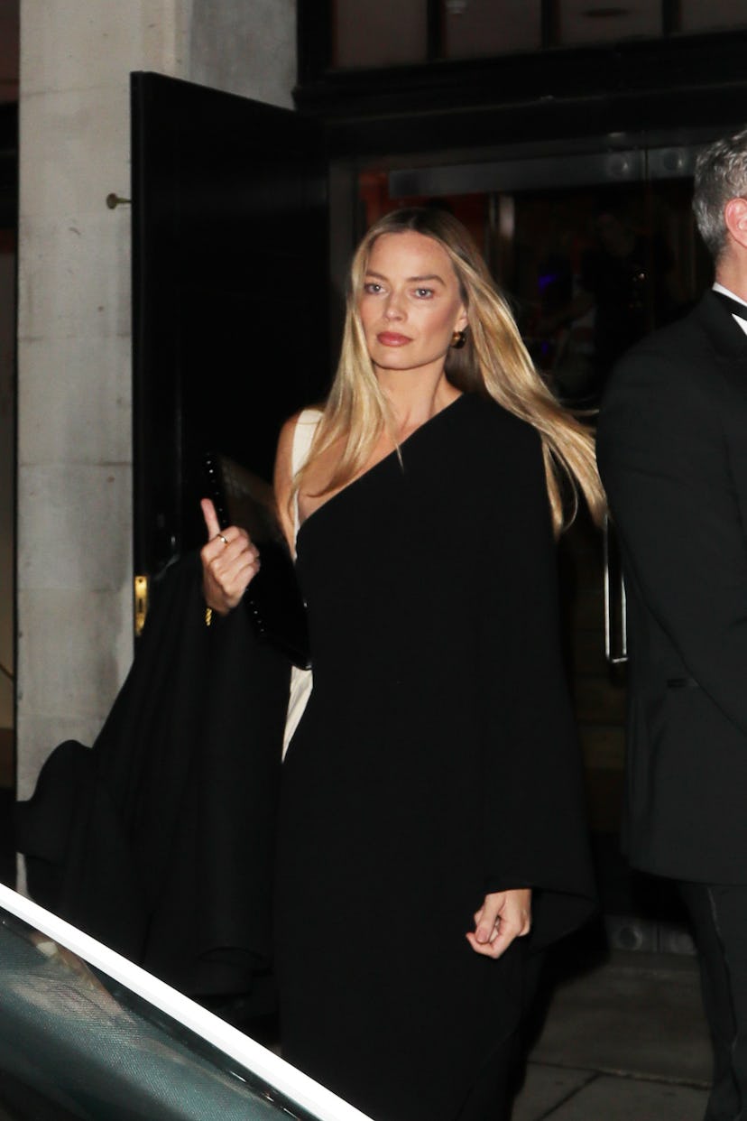 Margot Robbie seen attending War Child gala dinner on December 04, 2025 in London, England.