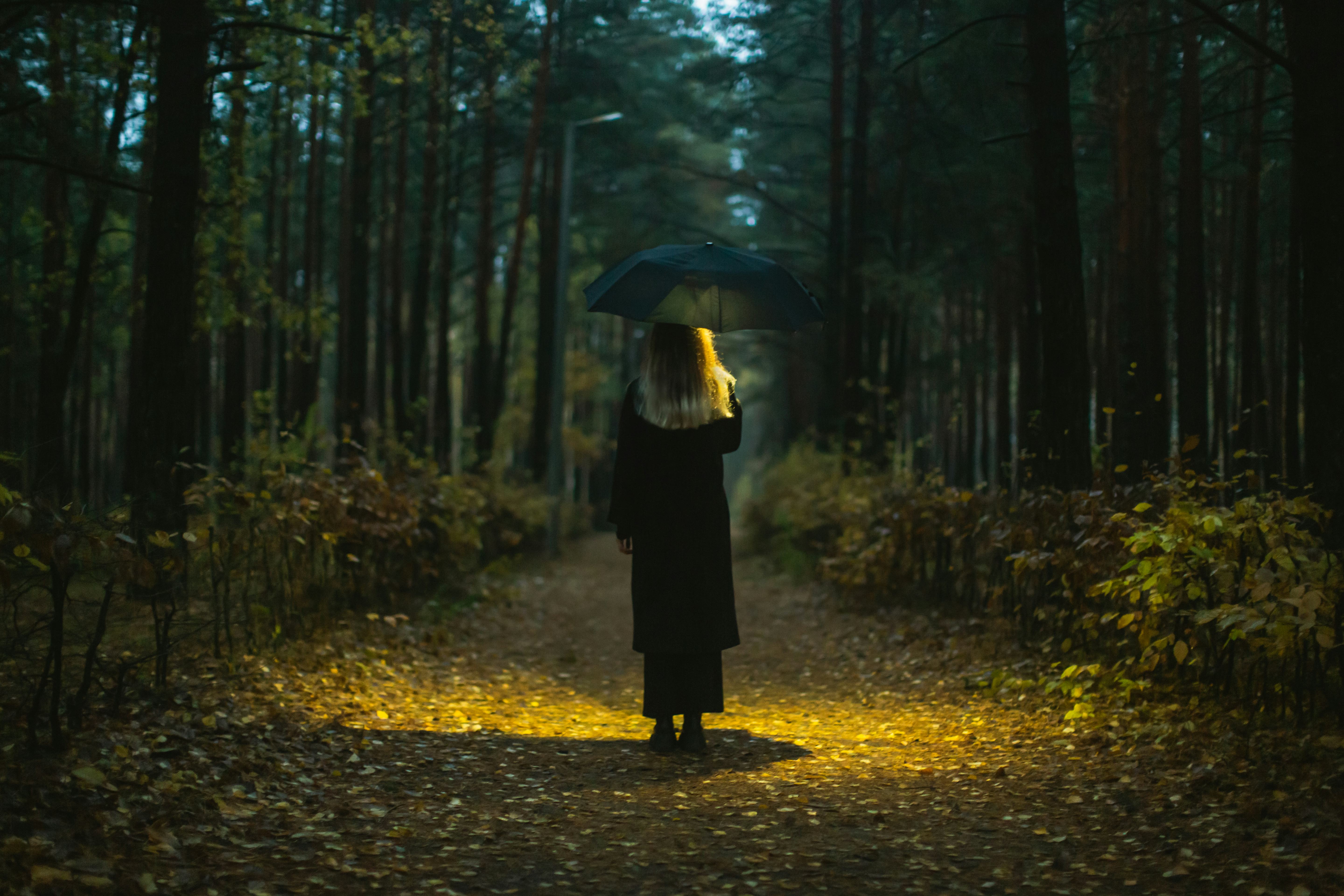 Woman with umbrella.