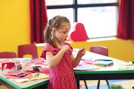 Children having crafting activity, diy valentine cards and superhero character
