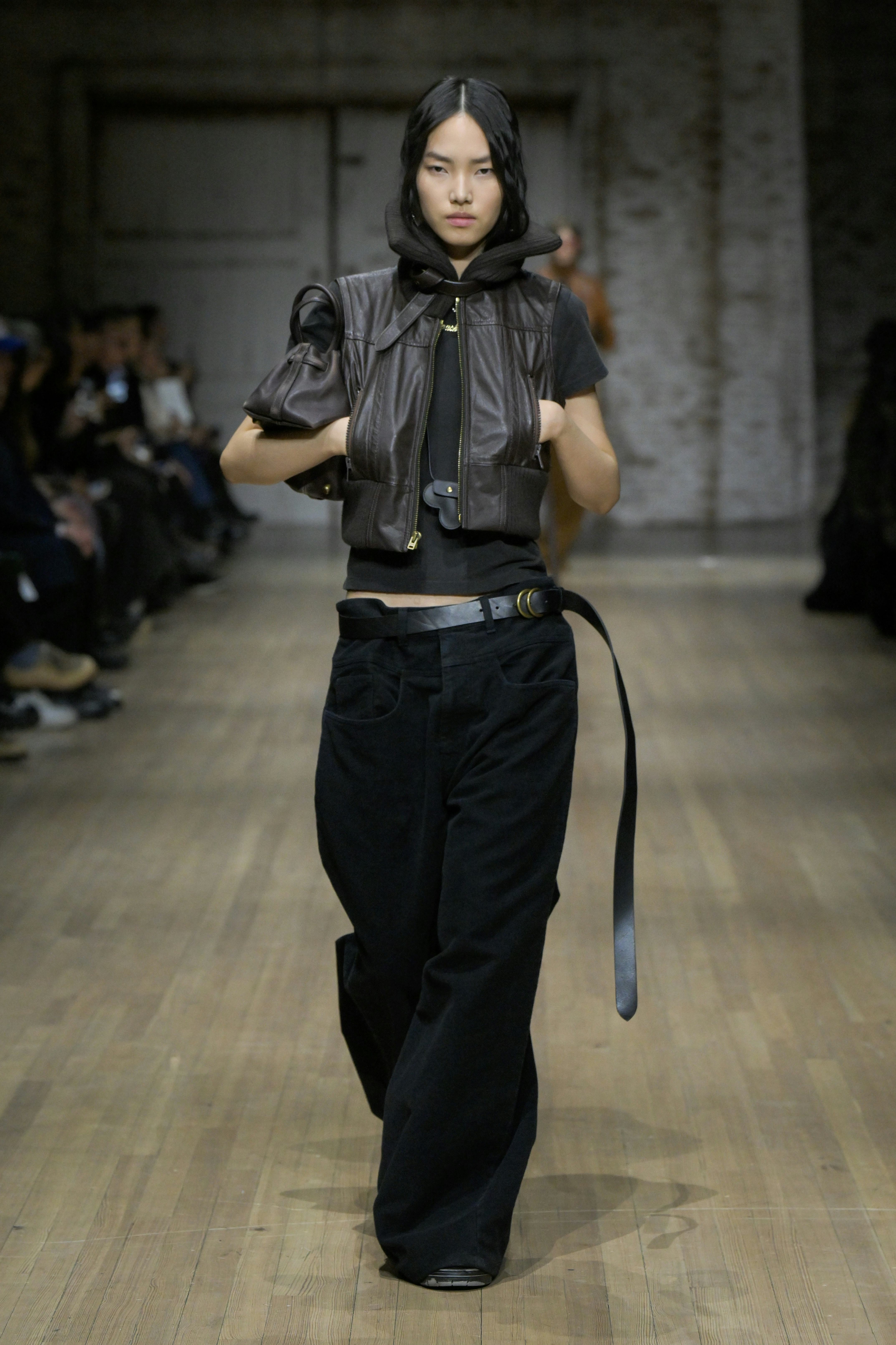 Model on the runway at the Coach Fall RTW 2025 fashion show 