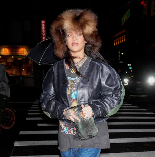 Rihanna dark green leather trench coat