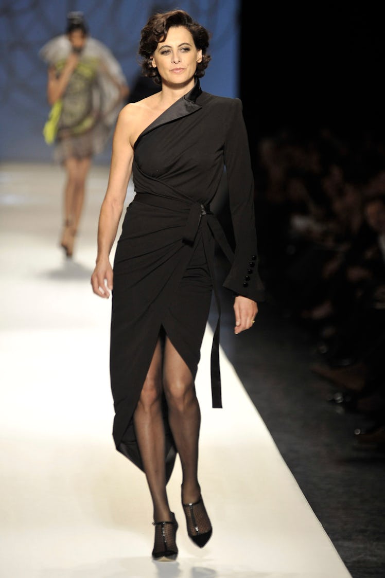 PARIS - JANUARY 28:  (UK OUT) A model walks the runway at the Jean Paul Gaultier fashion show during...