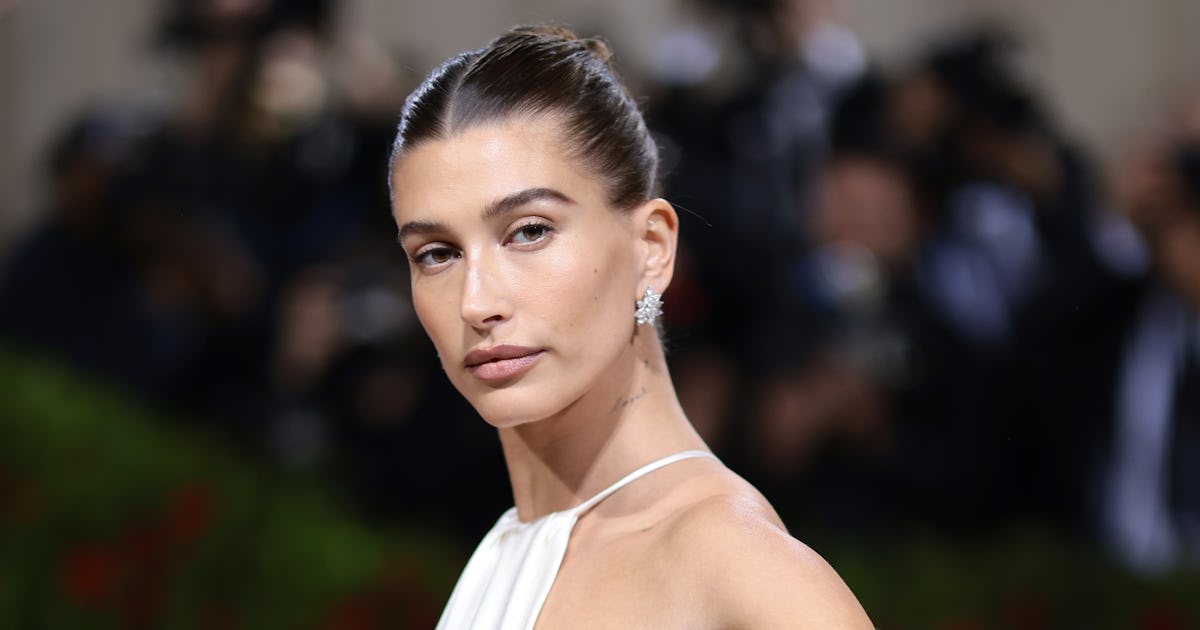 Hailey Bieber Wore A Sexy Plunging Crop Top To Support Her Bestie Bella Hadid