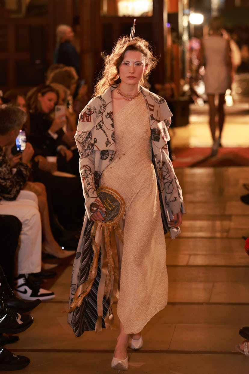 A model walks the runway at the Hector Maclean show during London Fashion Week February 2025 on Febr…