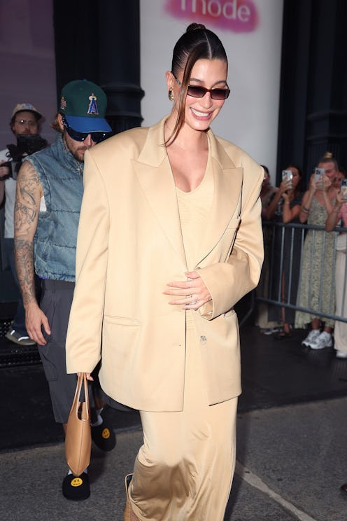 Hailey Bieber and Justin Bieber are seen together leaving her 'Rhode' pop up on June 23, 2024 in New...