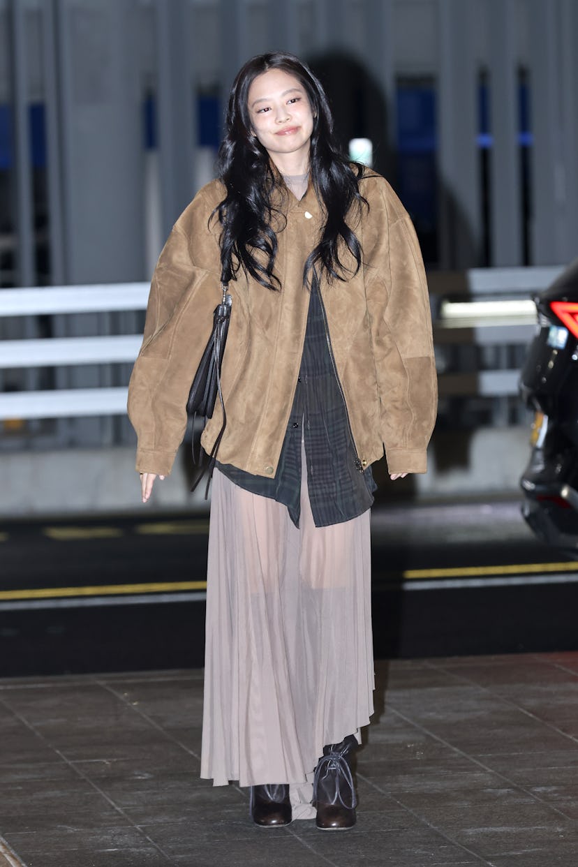 Jennie of South Korean girl group BLACKPINK is seen arriving for a departing flight from Incheon Int...
