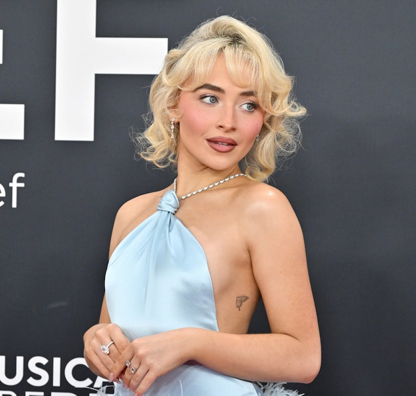 Sabrina Carpenter and Olivia Rodrigo shared a sweet moment at the 2025 Grammys despite feud rumors.