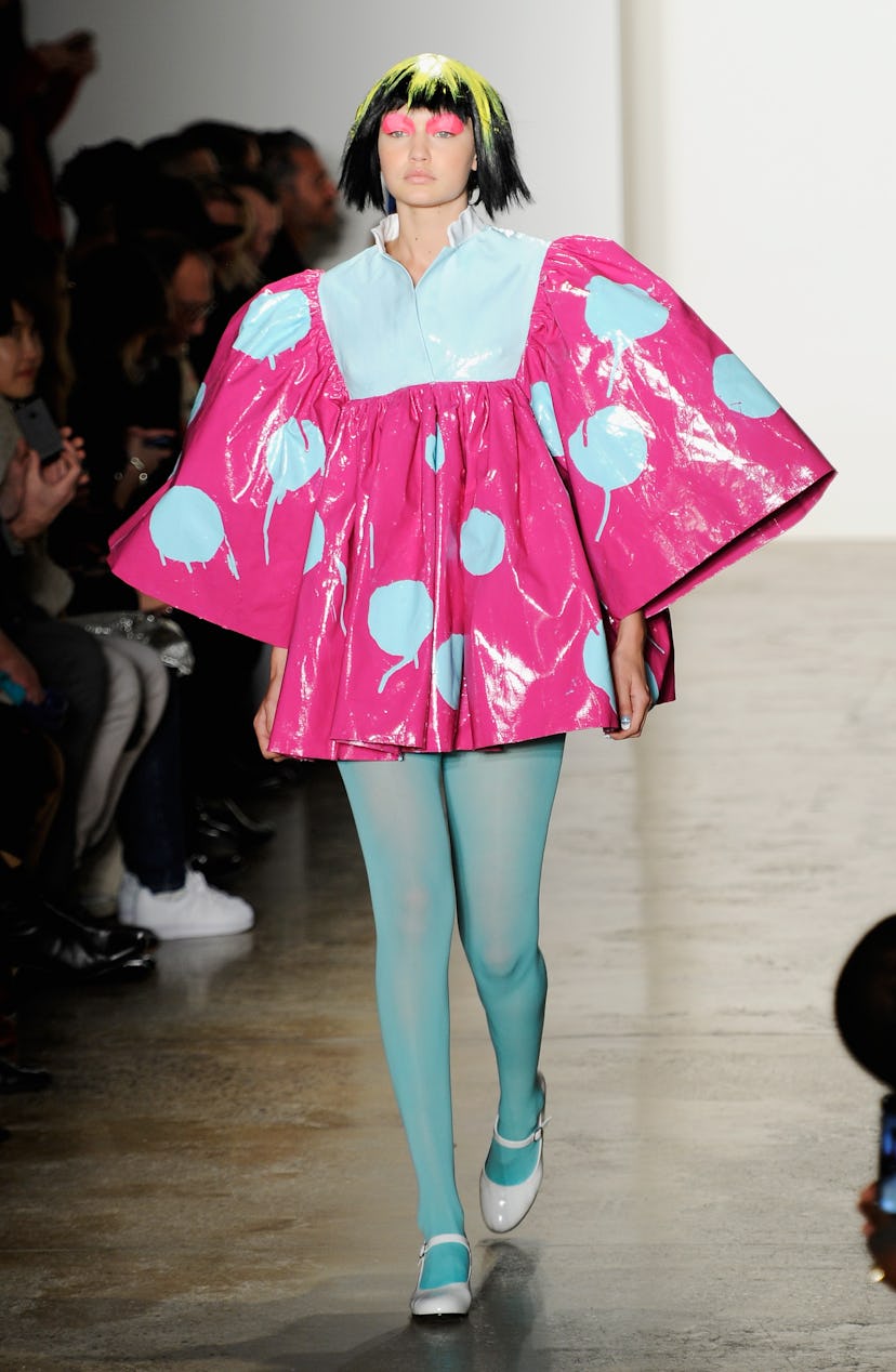 Gigi Hadid walks the runway at the Jeremy Scott fashion show during MADE Fashion Week Fall 2015 at M…