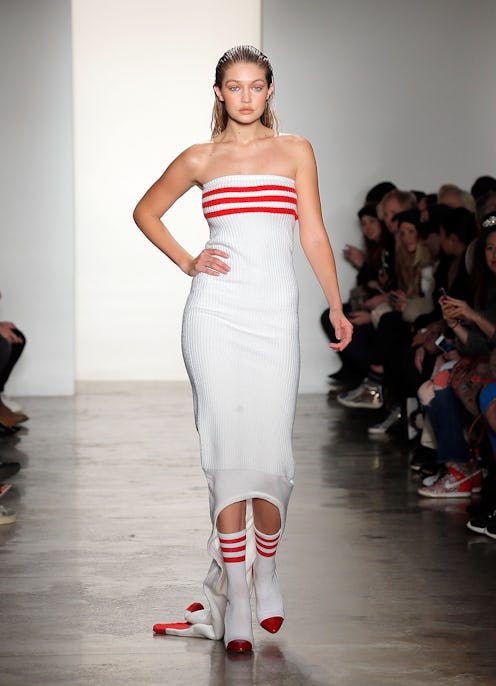 NEW YORK, NY - FEBRUARY 12: Model Gigi Hadid walks the runway at the Jeremy Scott Fashion show durin...