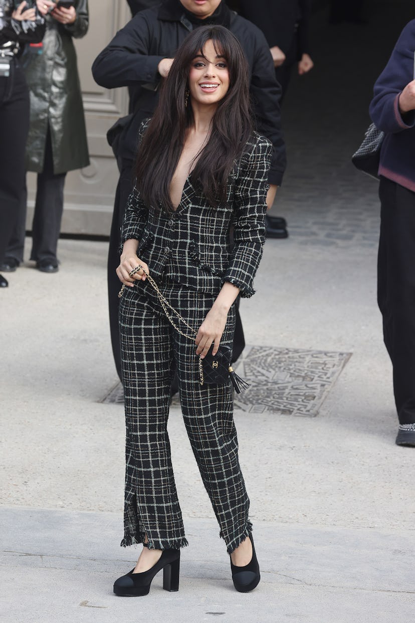 Camila Cabello wore a plunging corp sleaze suit.