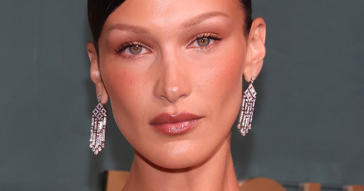 Bella Hadid Freed The Nipple In A See-Through Lace Dress At Paris Fashion Week