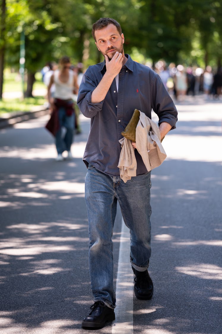 MILAN, ITALY - JUNE 17: Matthieu Blazy wears blue Ralph Lauren shirt, jeans, blue shoes, outside Guc...