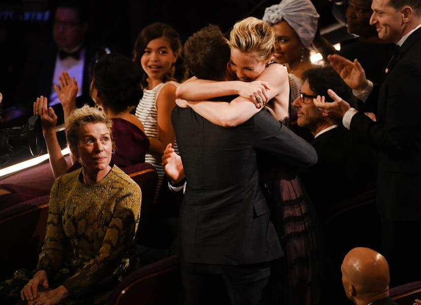 Sam Rockwell, and Leslie Bibb celebrate his Oscar win