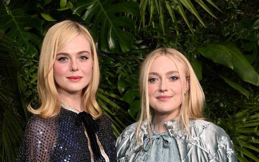 BEVERLY HILLS, CALIFORNIA - MARCH 01: (L-R) Elle Fanning and Dakota Fanning attend the CHANEL and Ch...