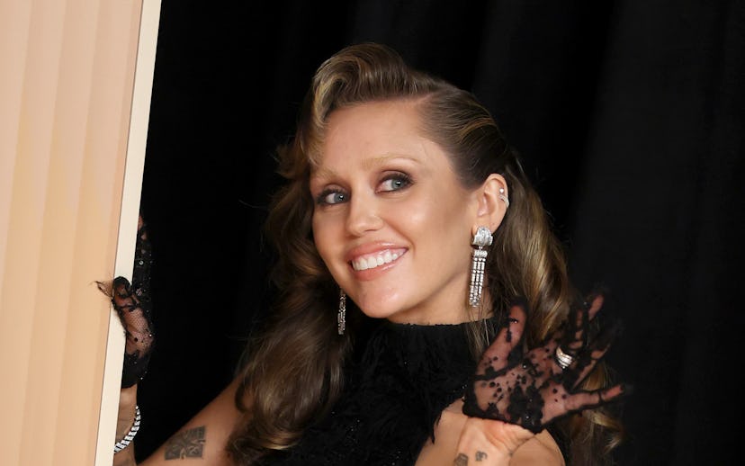 HOLLYWOOD, CALIFORNIA - MARCH 02: Miley Cyrus poses in the press room during the 97th Annual Oscars ...