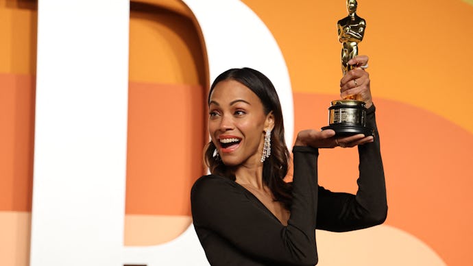 US actress Zoe Saldana poses with the Oscar for Best Actress in a Supporting Role for "Emilia Perez"...