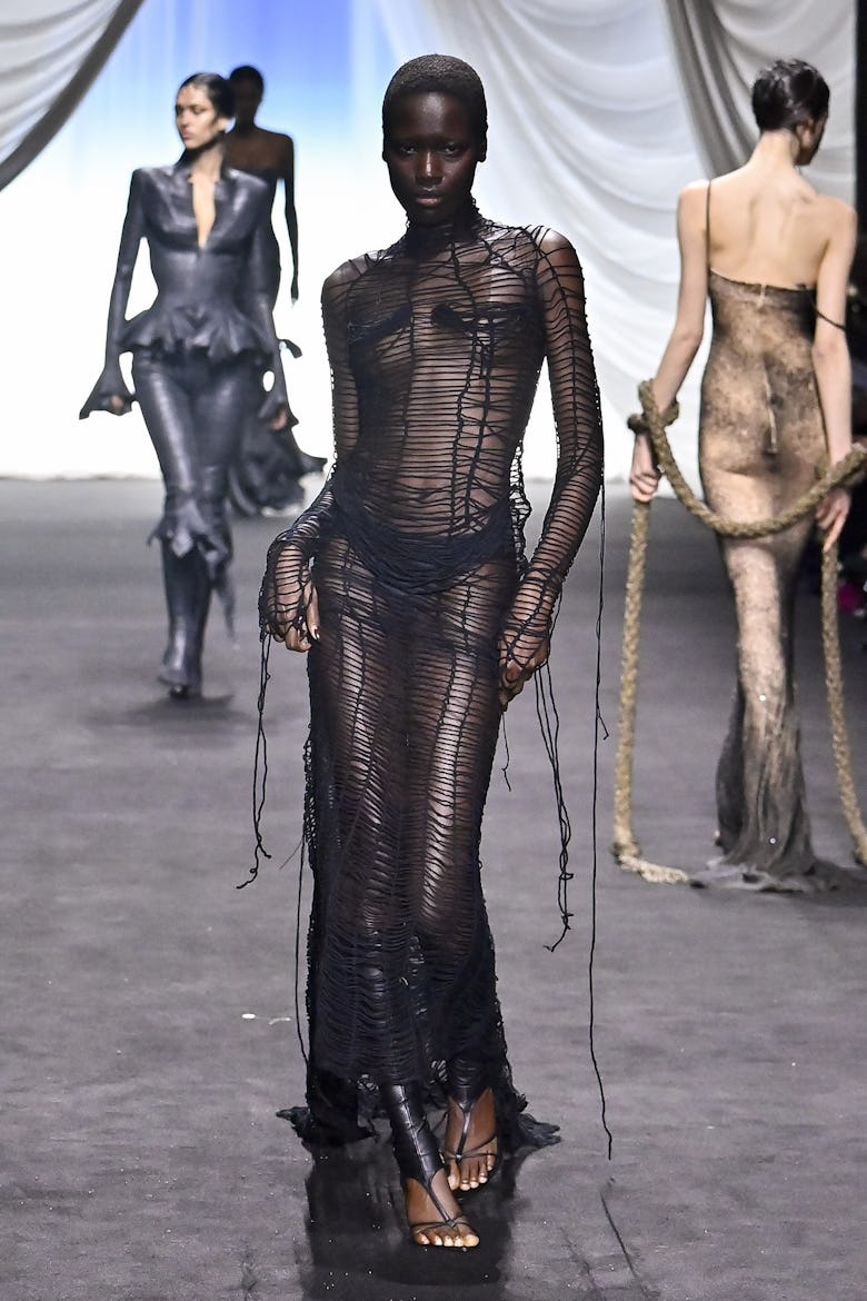 A model walks the runway during the Jean Paul Gaultier by Ludovic de Saint Sernin Haute Couture Spri...