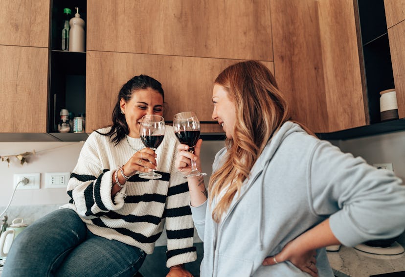 Have a glass of wine before kissing each other.