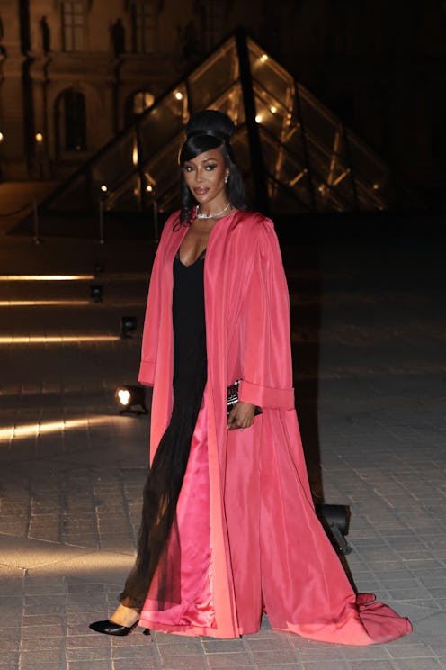 British top model Naomi Campbell poses for photos as she arrives to attend the annual fundraising ev...