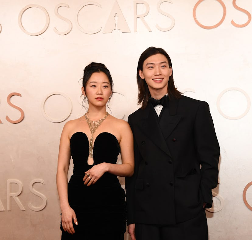 Gia Kim and Sang Heon Lee dish on Season 3 of 'XO, Kitty' while attending the 2025 Oscars.