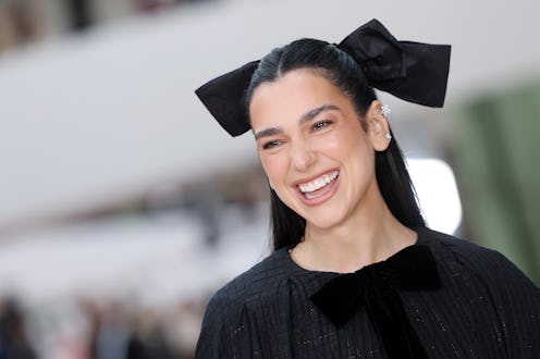Dua Lipa wore a knit co-ord with short shorts in New Zealand.
