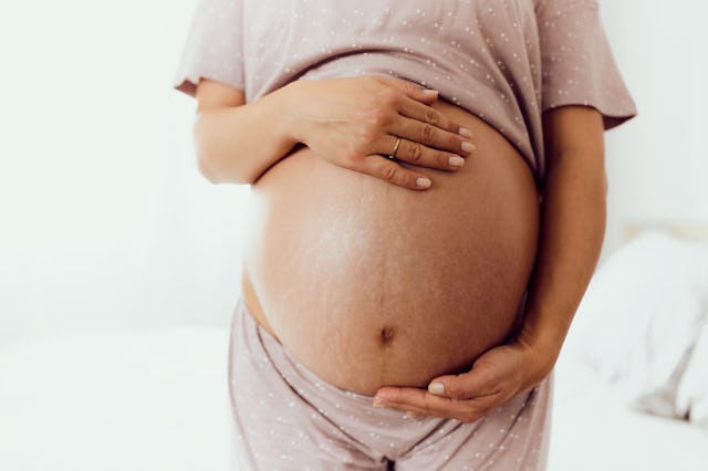 Pregnant woman's stomach. Pregnancy-related deaths are increasing in the US.