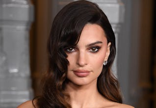 EmRata wore a plunging blazer to dinner with her son.