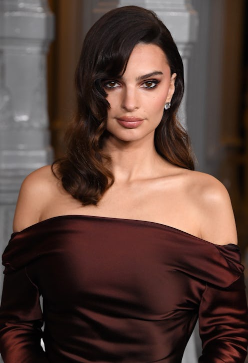 EmRata wore a plunging blazer to dinner with her son.