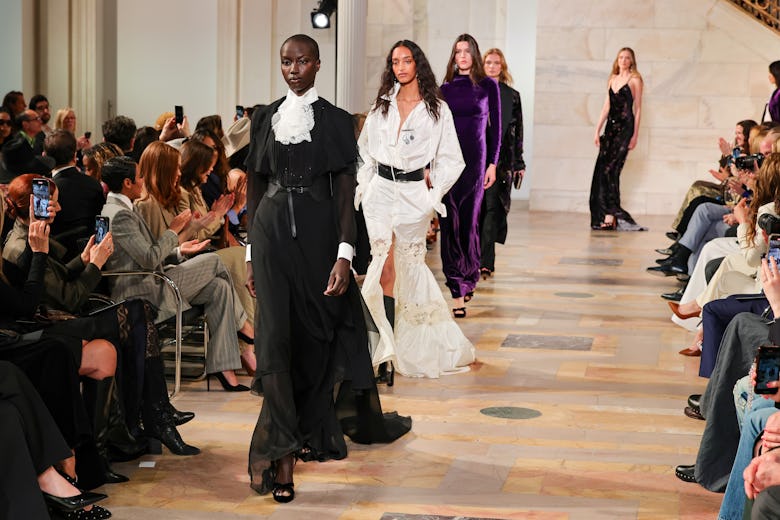 NEW YORK, NEW YORK - APRIL 17: (L-R) Anok Yai, Mona Tougaard and Vivienne Rohner walk the runway for...