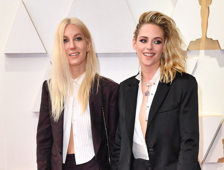 US actress Kristen Stewart (R) and fiancee Dylan Meyer attends the 94th Oscars at the Dolby Theatre ...