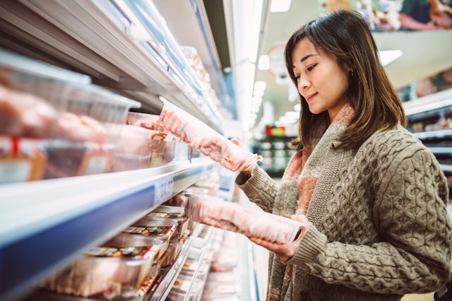 Chicken wings are displayed at a grocery store. The USDA withdrew a rule that intended to reduce sal...
