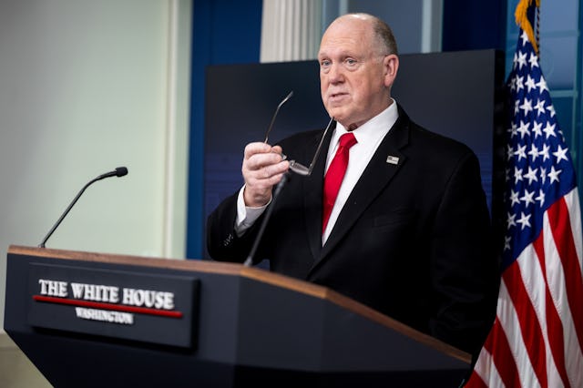 Tom Homan, White House border czar, during a news conference. He stands behind a podium with an Amer...