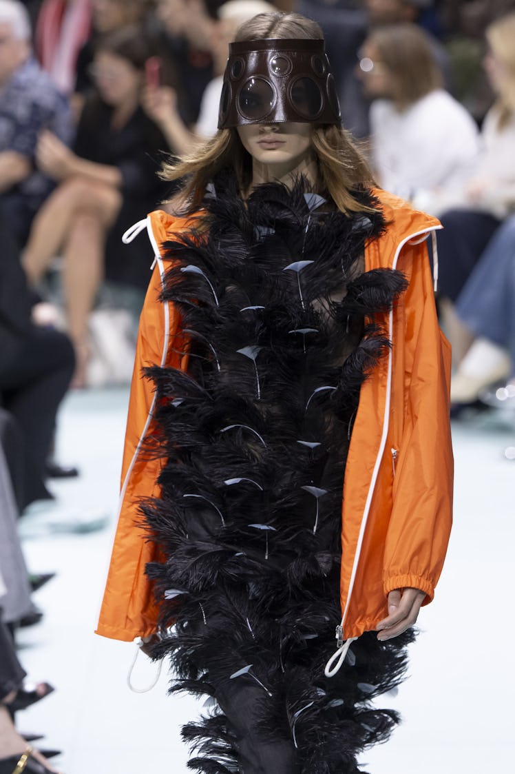 MILAN, ITALY - SEPTEMBER 19: A model walks the runway during the Prada Ready to Wear Spring Summer 2...