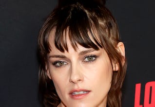 Kristen Stewart leather bralette Thom Browne suspenders